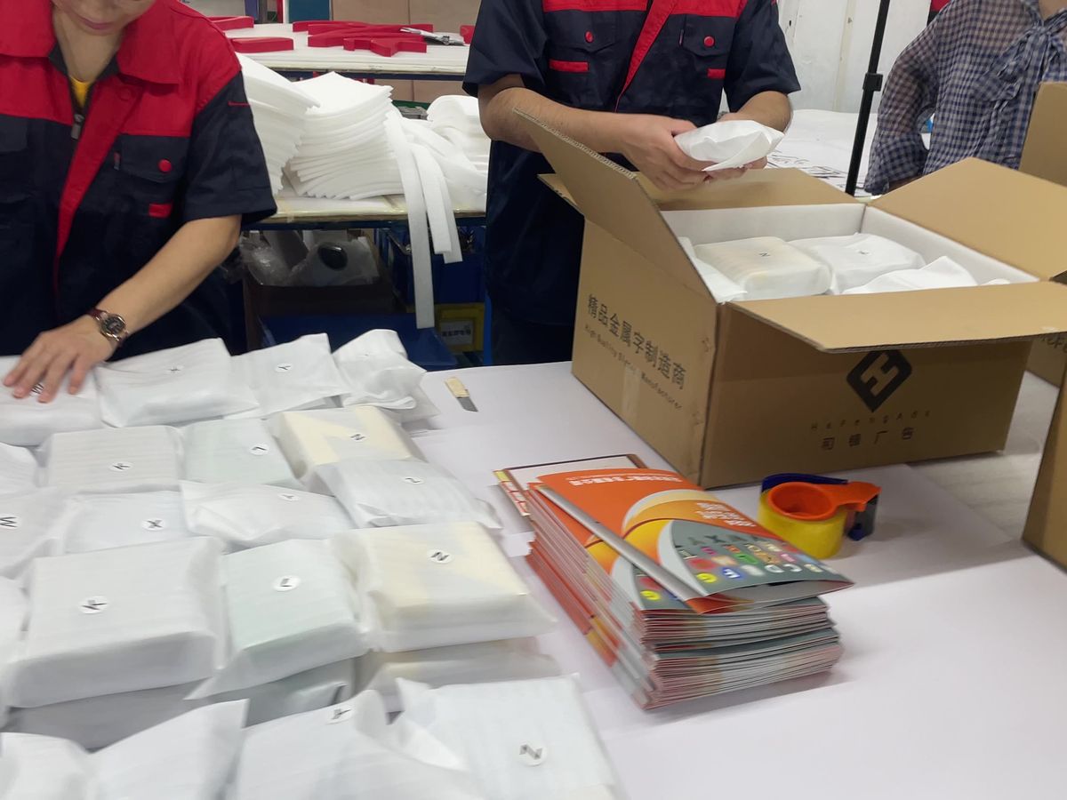 Packing pouches into cartons