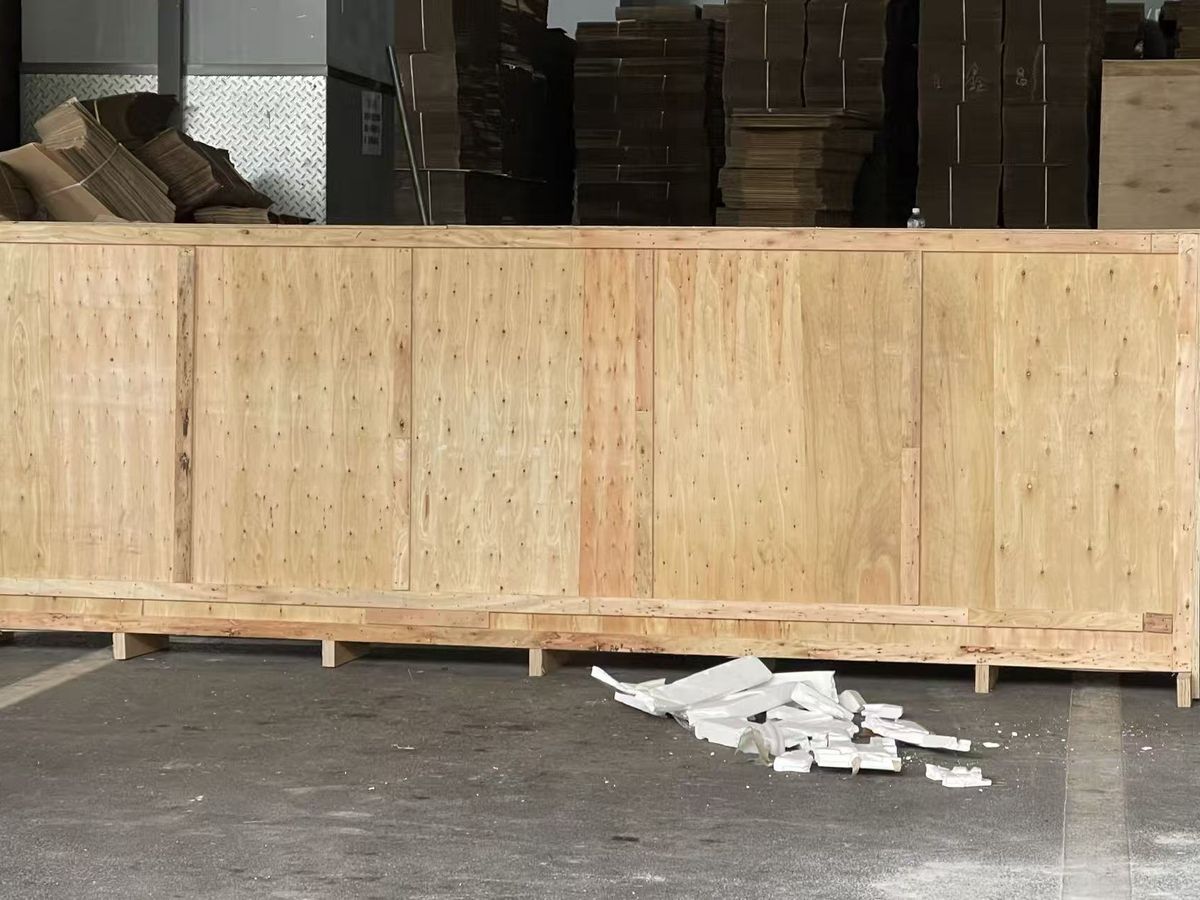 Crate being secured for shipping