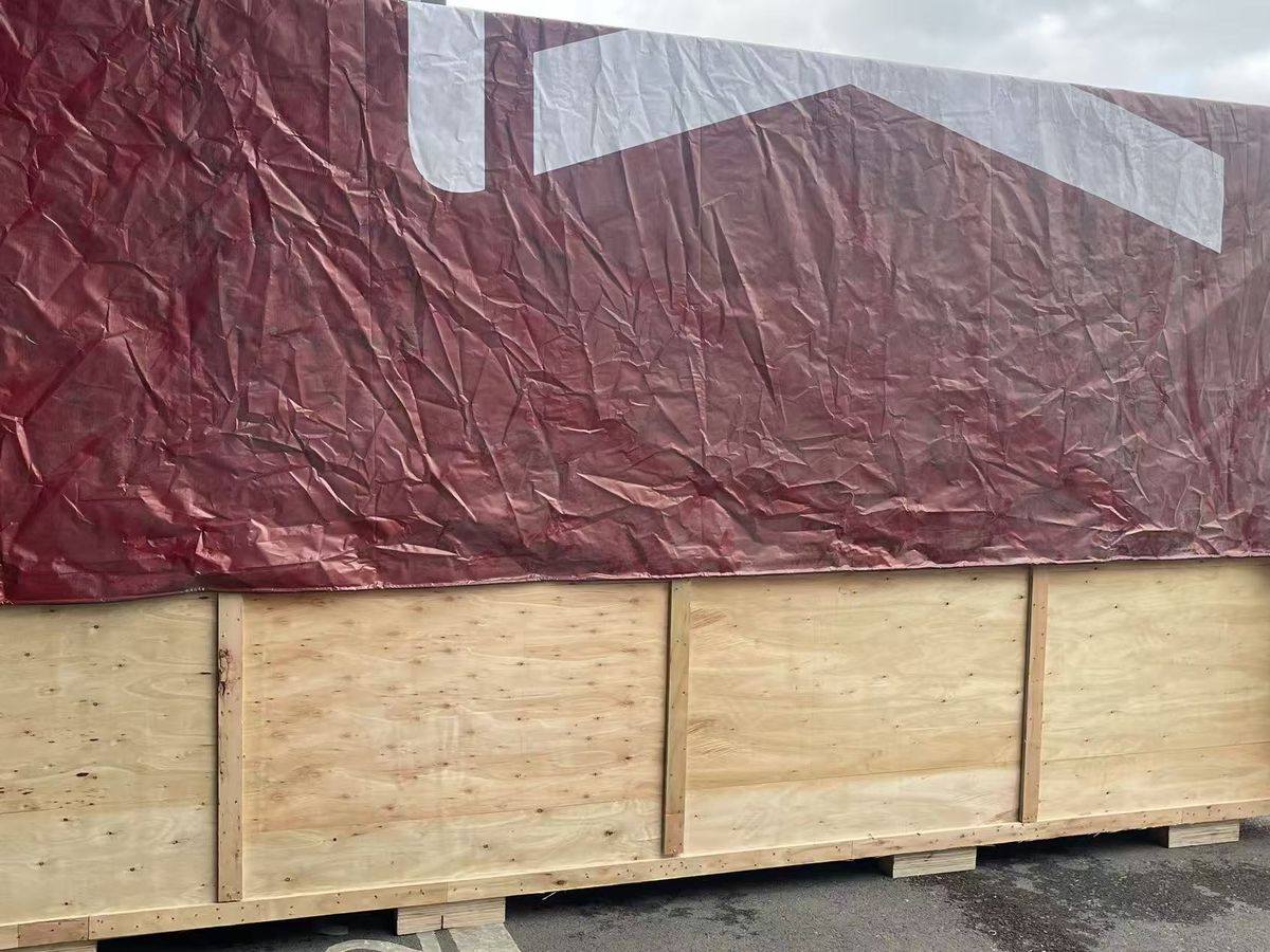 Tarp-covered truck departure