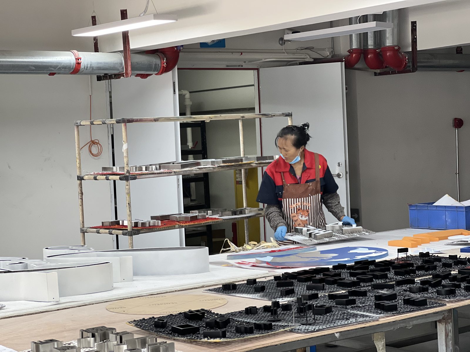 LED modules being assembled into illuminated letters